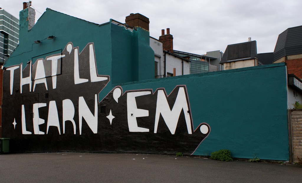 Image of graffiti stating "that will learn them" from Sheila Blige