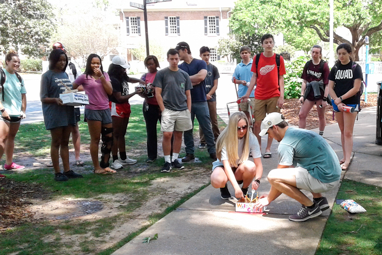 students firing marshmallow launchers on the Quad