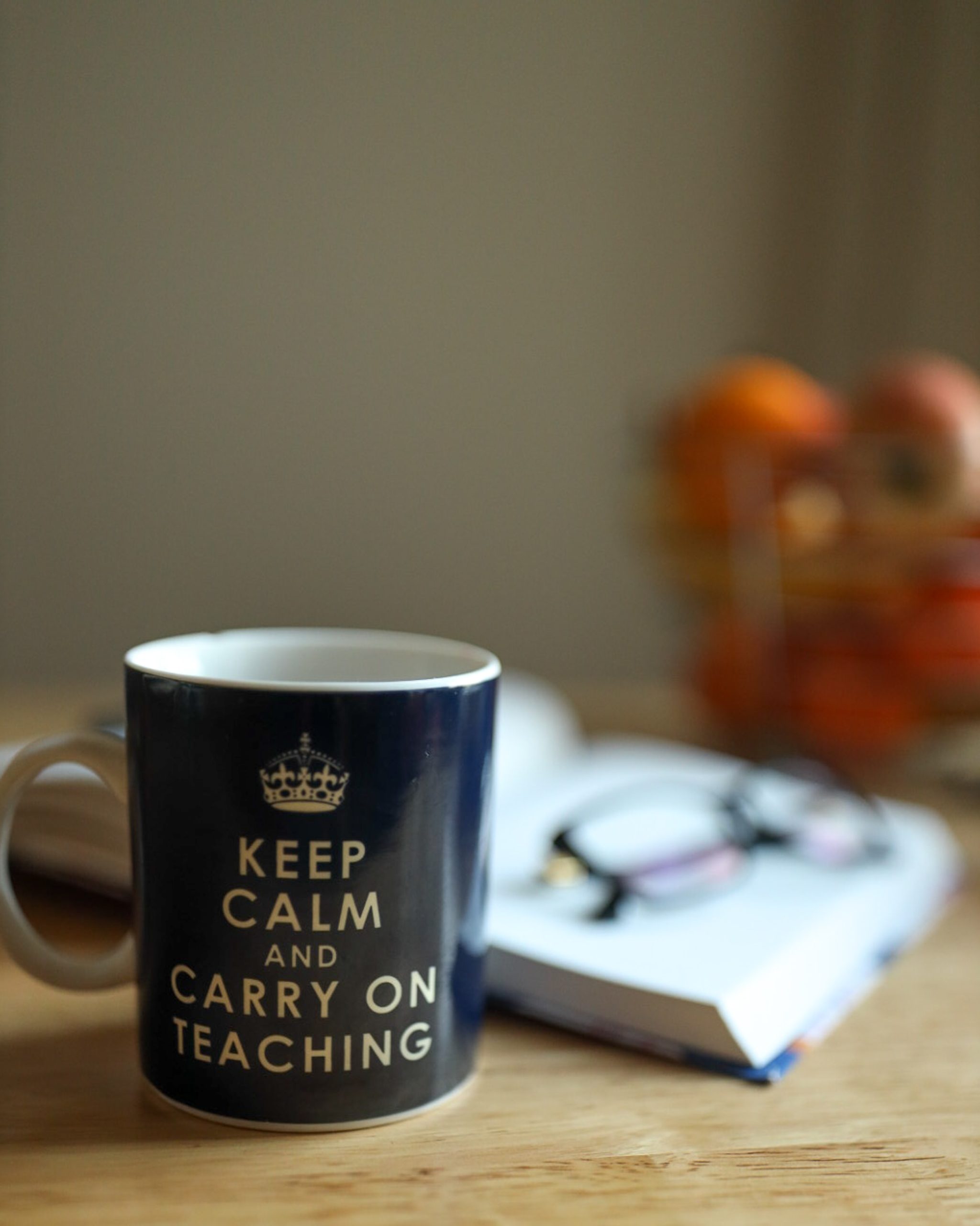 A mug with the saying "Keep calm and carry on teaching."